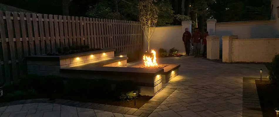 Fire pit and paver patio installed at a home in Lakeland, TN.