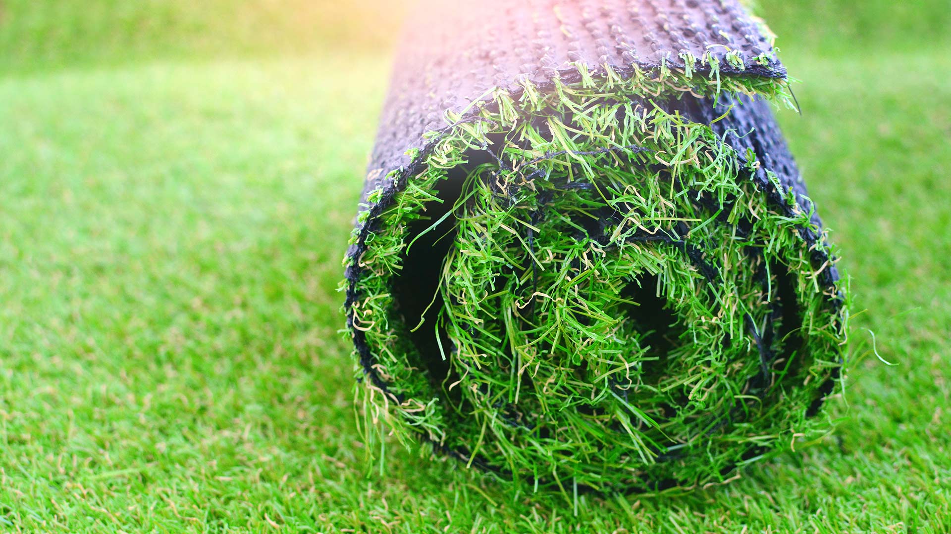 A roll of artificial turf ready for installation in Memphis, TN.