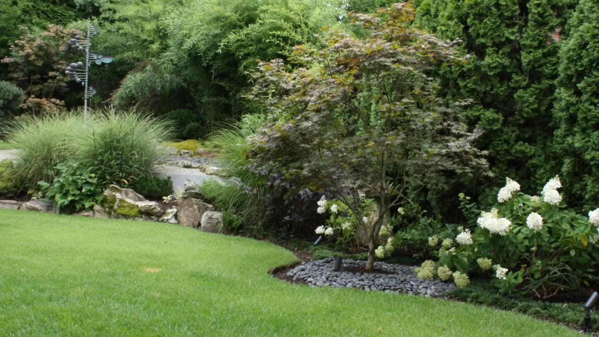 Landscape bed with installed shrubs and plantings in Piperton, TN.