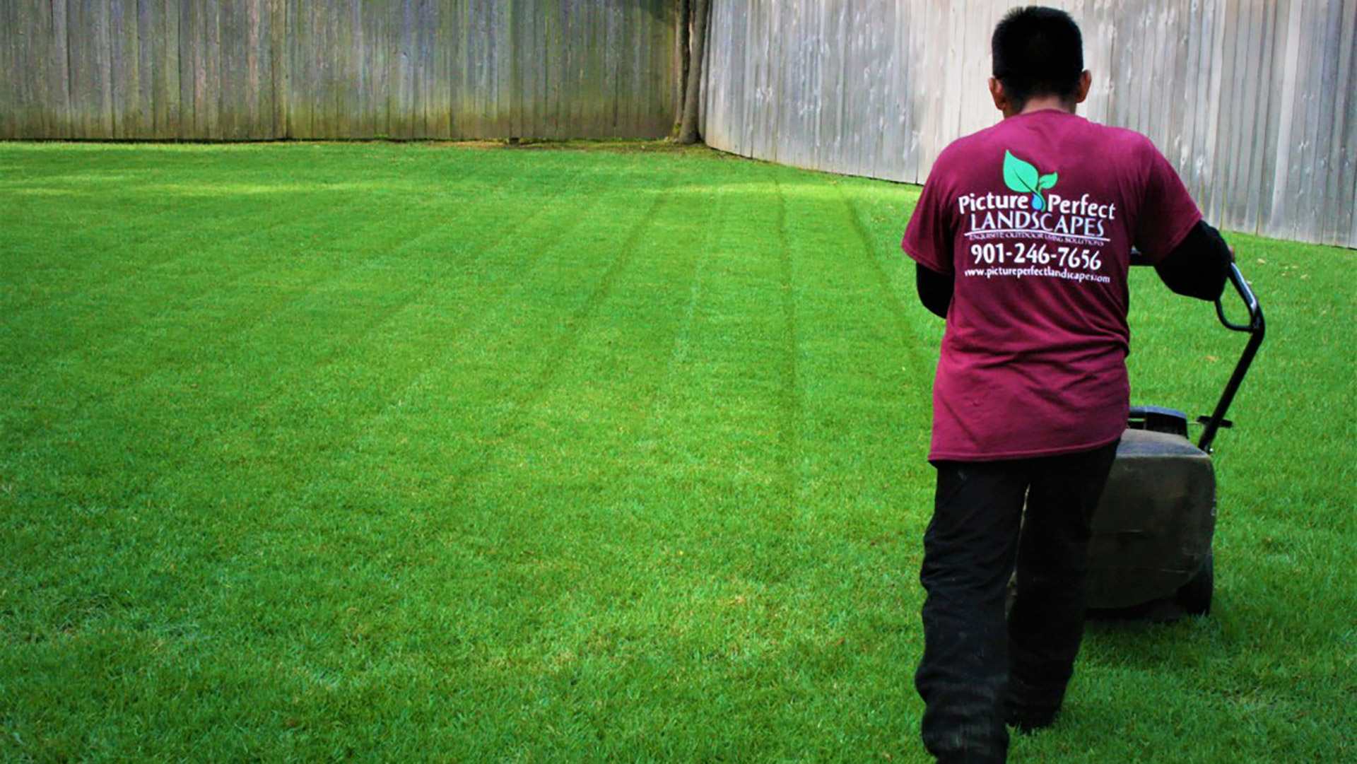 Our landscaper mowing a lawn on a property in Midtown Memphis, TN.