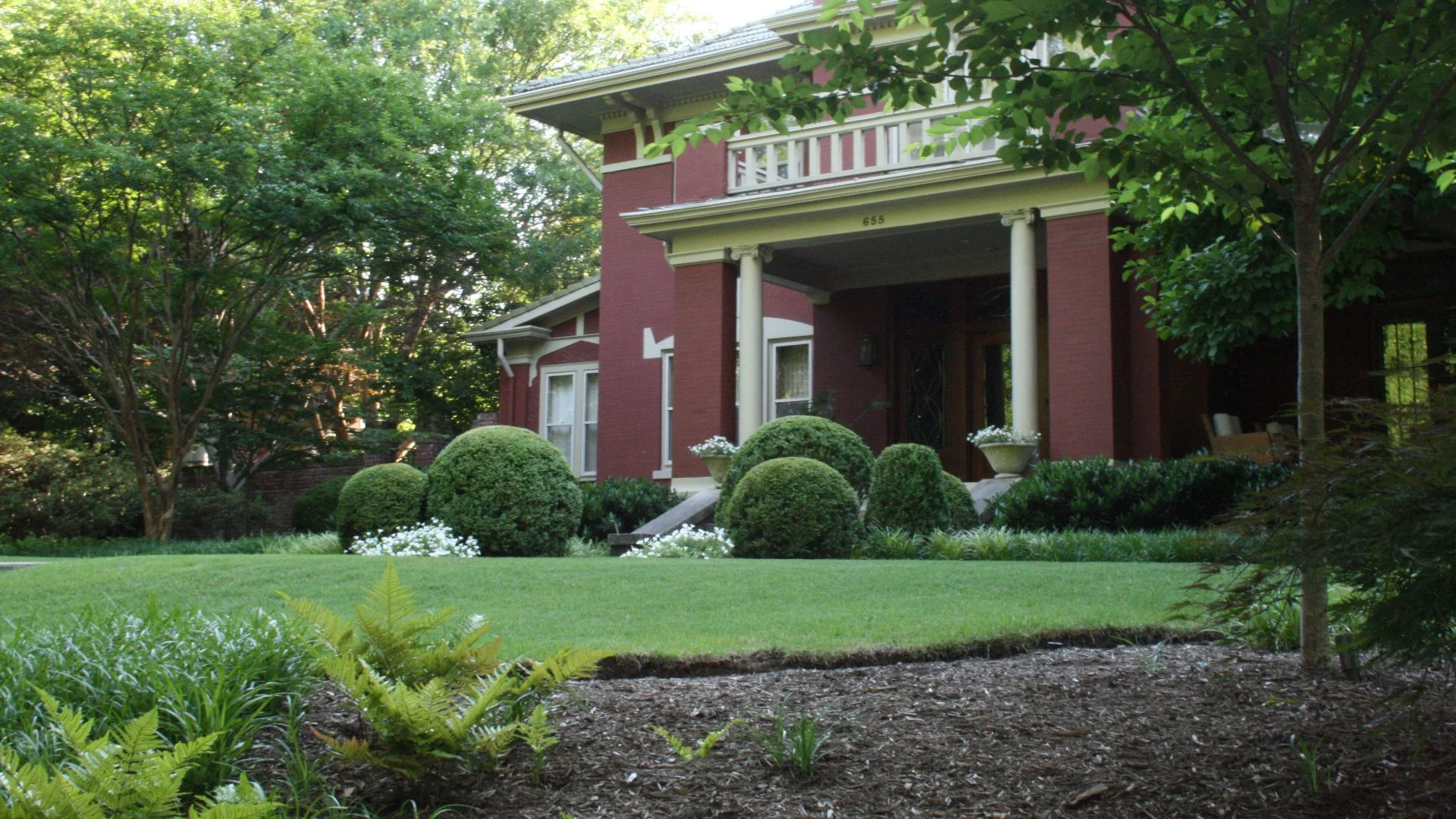Flowers and shrubs in landscape beds.
