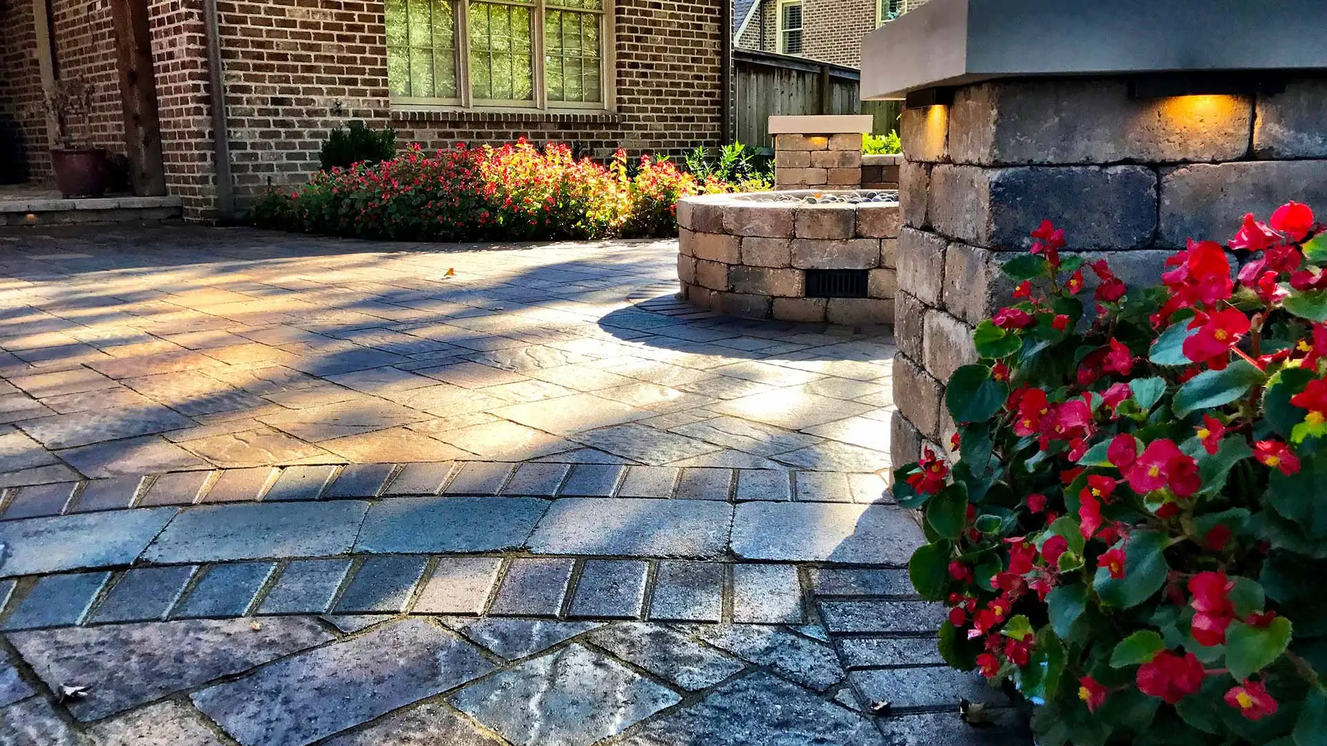 Custom paver patio and fire pit at a home in East Memphis, TN.