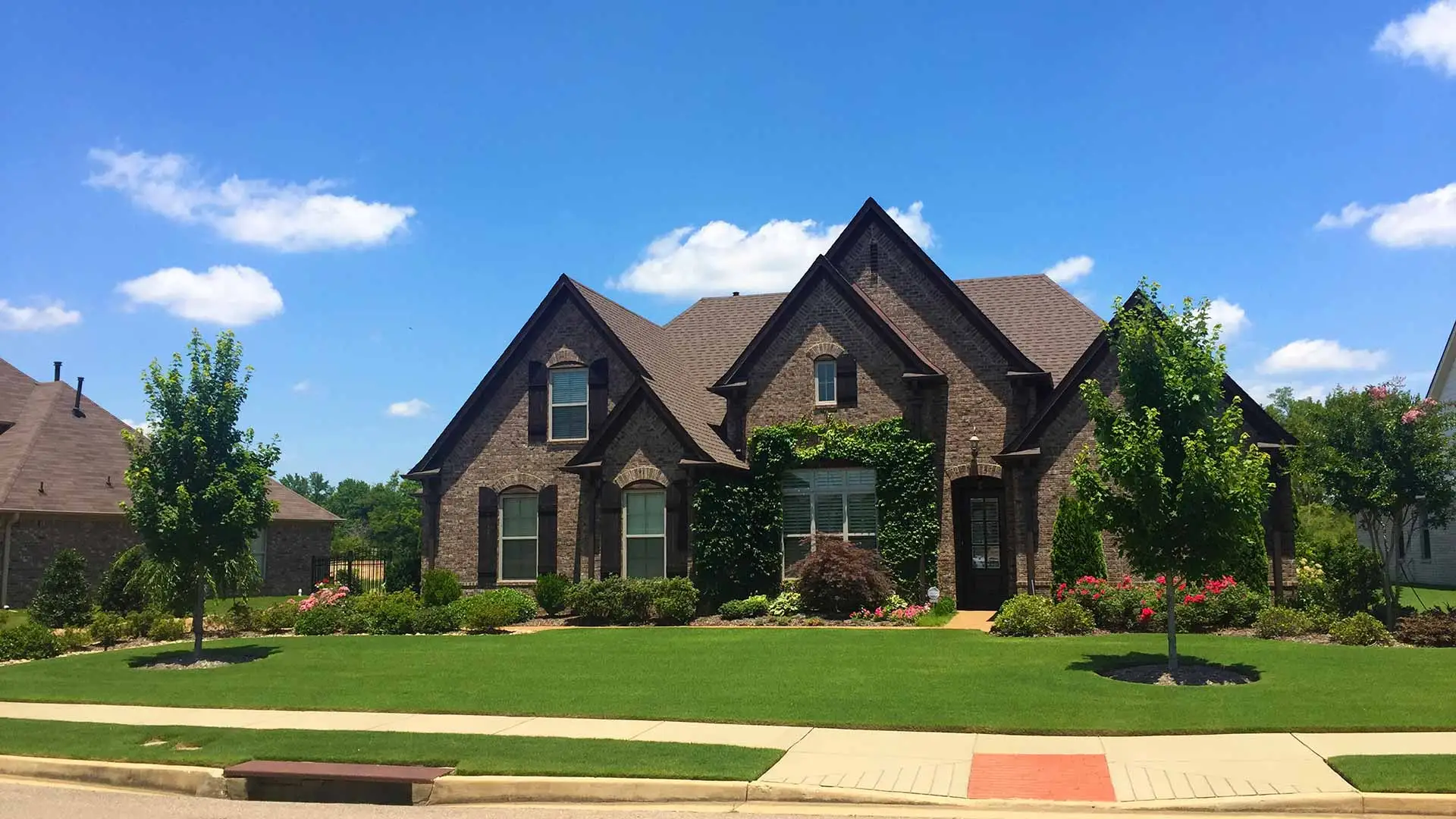 Lakeland, TN property with regular lawn and landscape maintenance.