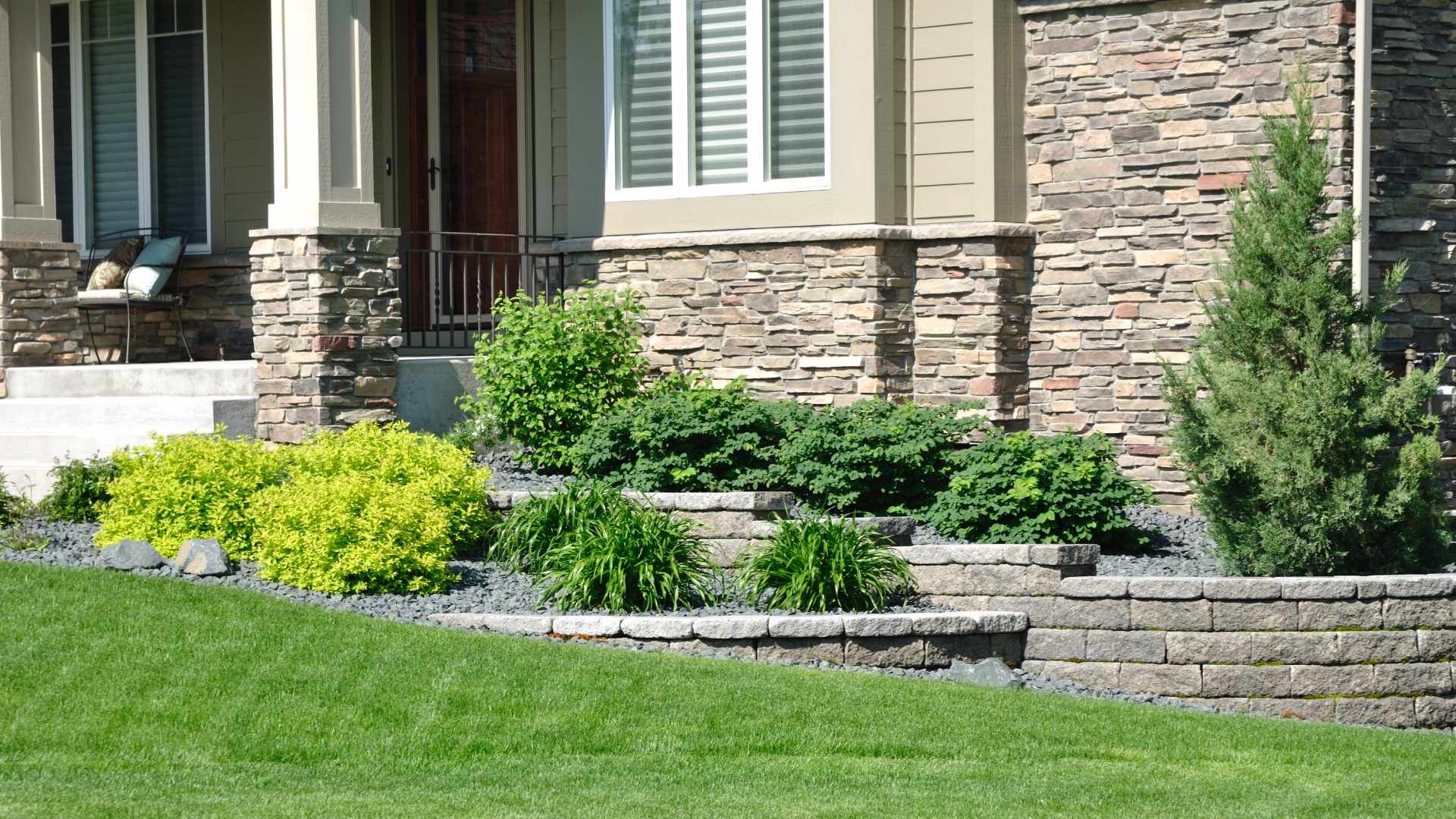 Blend Functionality & Style With a Retaining Wall for Your Sloped Yard