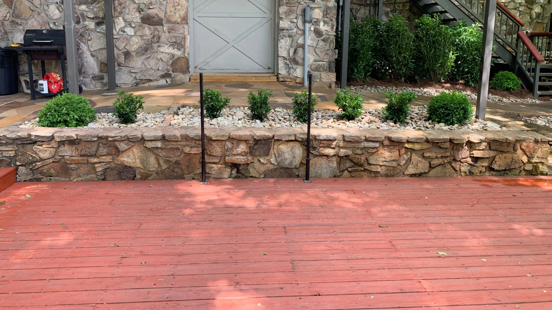 Have a Sloped Yard but Want a Patio? A Retaining Wall Is Just What You Need