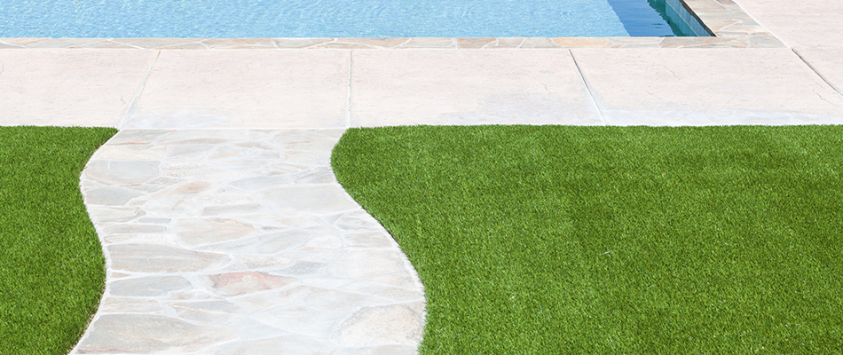 Artificial turf installed by a poo deck in Collierville, TN.