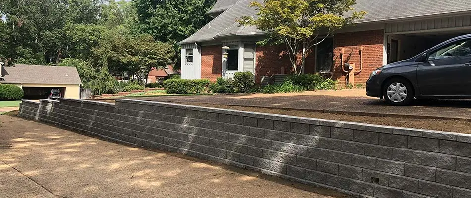 Custom retaining wall along driveway in Germantown, TN.