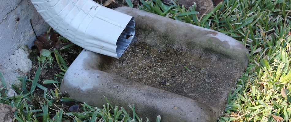 a downspout drainage redirecting water from foundation of a home in Collierville, TN.