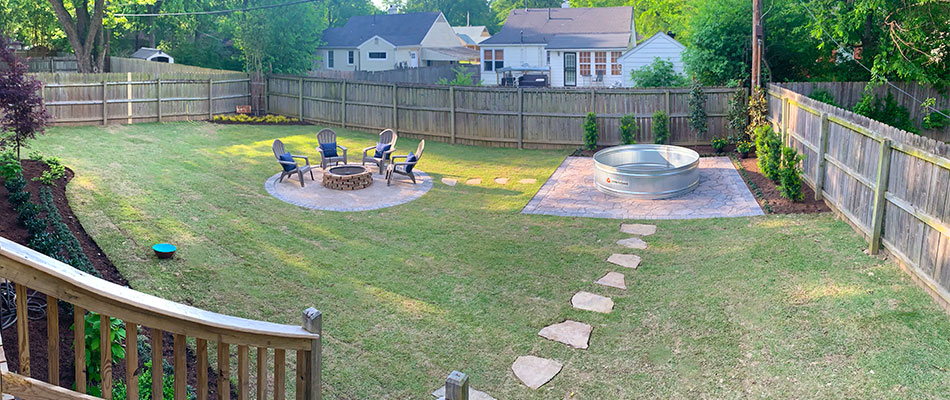 Completed sod installation in back yard around a patio in Bartlett, TN.