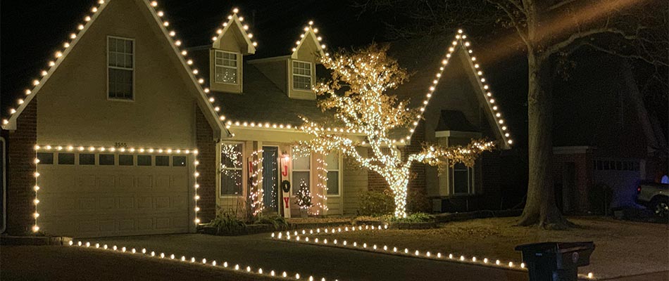Home with holiday lighting installed near Arlington, TN.