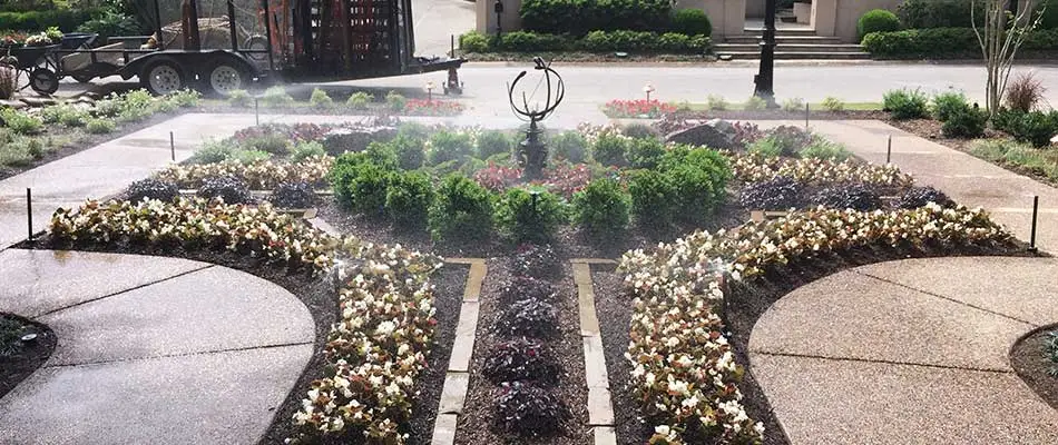 Irrigation system watering landscape bed in Memphis, TN.