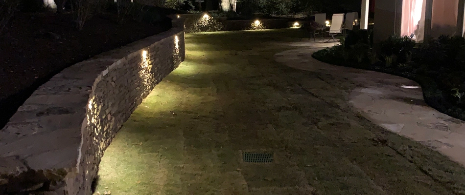 Landscape lighting installed with seating walls in Germantown, TN.