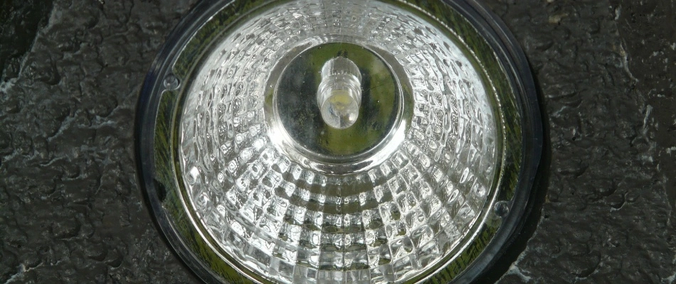 A LED lightbulb ready for lighting installation in Memphis, TN.