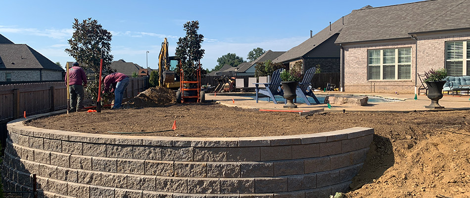 Picture Perfect professionals building a retaining wall for clients in Oakland, TN.