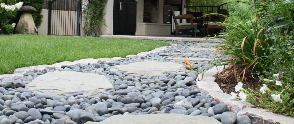 Rock walkway installed towards patio in Shelby County, TN.