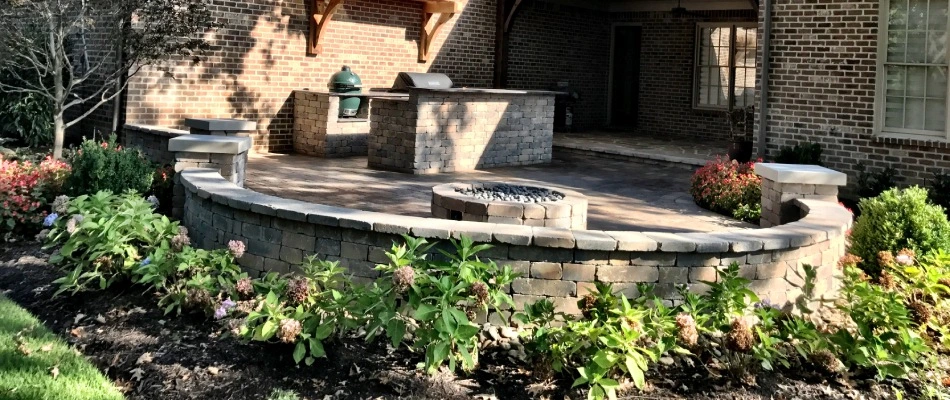 Seating wall installed by fire pit area on patio in Bartlett, TN.