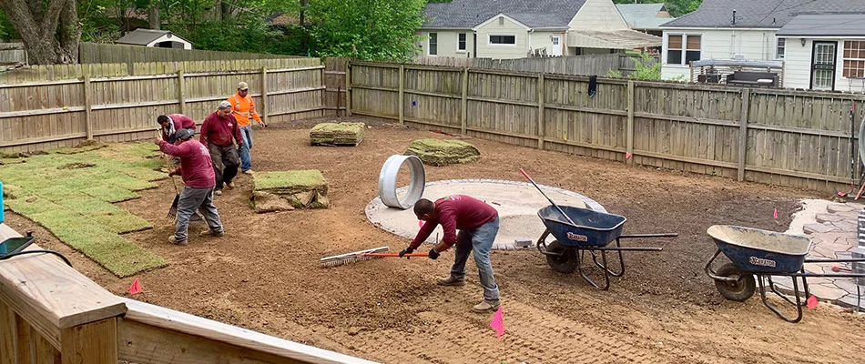 Sod installation underway in the back yard of a Bartlett, TN home.