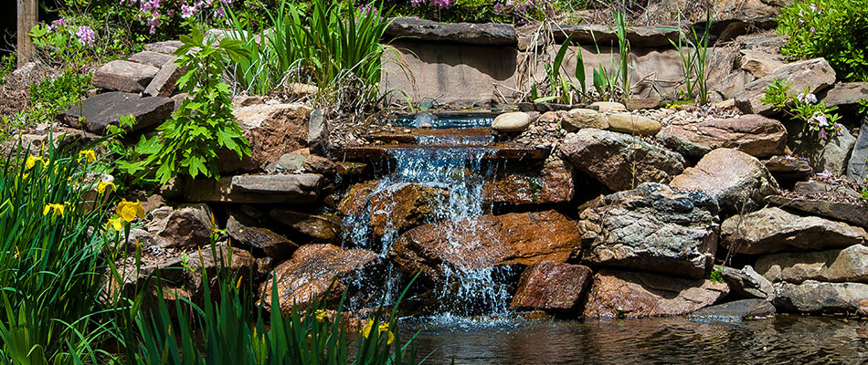 Waterfall installed with pond in Collierville, TN.